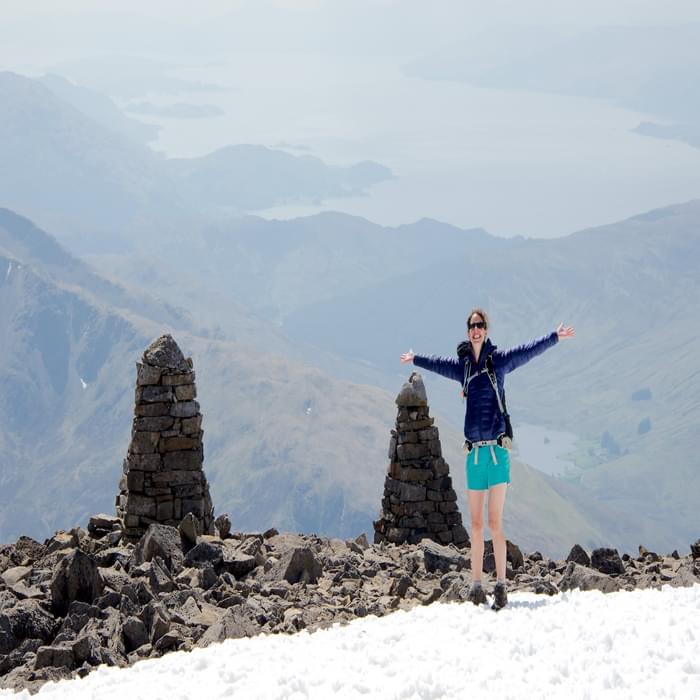 Alice is happy to find the navigation cairns on the summit plateau of Ben Nevis