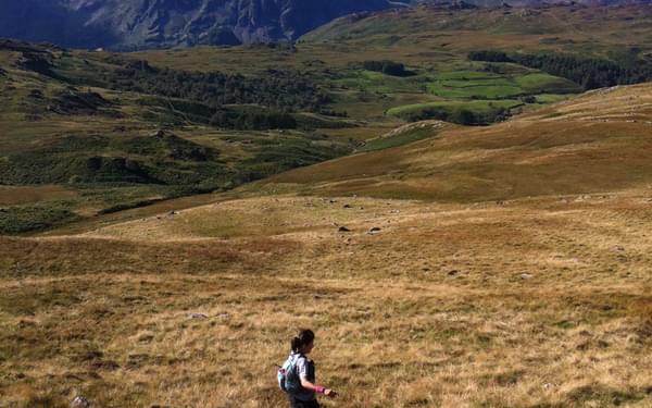 Lily running in the Lakeland fells. Photo by Chris Councell.