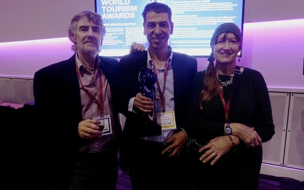 Bashir Daoud, CEO Jordan Trail Association (centre), with Tony and Di after the presentation of the World Tourism Award at this years World Travel Show in London.