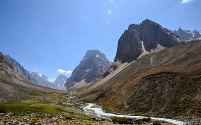 The Ravmeddara Valley is a true gem. This wide valley in the western Pamirs is fringed by towering mountains, with the 6083m high Patkhor Peak marking the highest point in the Rushan Range. Photo: Christine Oriol