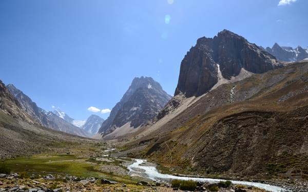 The Ravmeddara Valley is a true gem. This wide valley in the western Pamirs is fringed by towering mountains, with the 6083m high Patkhor Peak marking the highest point in the Rushan Range.  Photo: Christine Oriol
