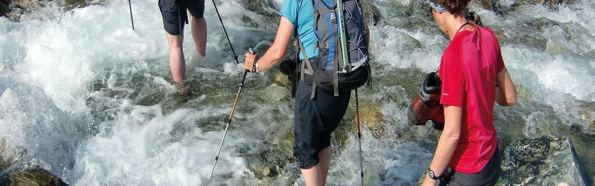 Chilled feet were guaranteed when crossing a stream of snowmelt above Berghaus Vereina  (photo from the Silvretta by Kev Reynolds)
