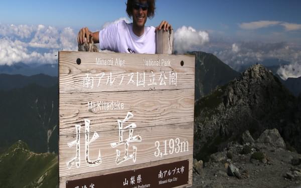 Kitadake14 The author poses in front of one of Japan’s largest summit signposts