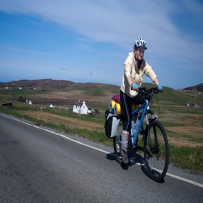 Road touring in the Hebrides with sleeping mats strapped to the rack (Image by Richard Barrett)
