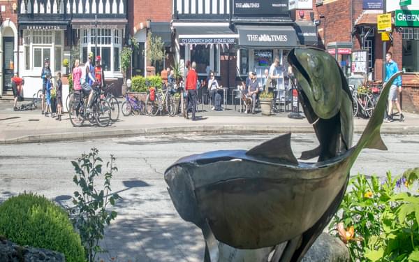The three rivers that meet in Whalley  - the Hodder, Calder and Ribble – are represented  both on the town’s arms  and this sculpture as three fishes.