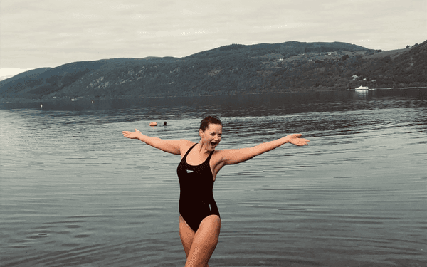 Sarah looking very happy about a wild swim in Loch Ness