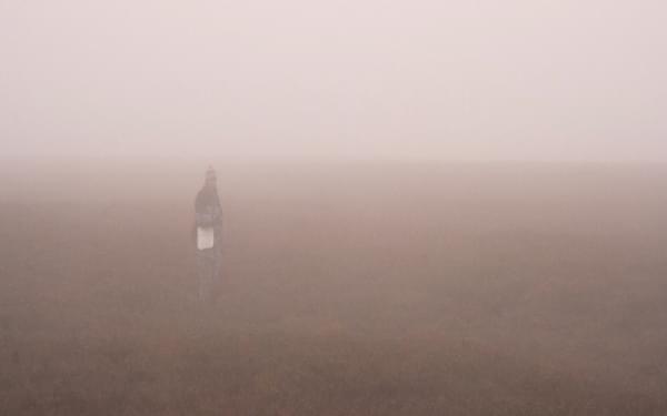 Walker in mist
