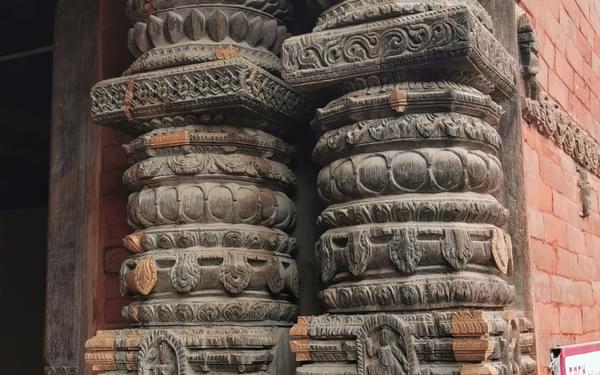 The handcarved detail on the sacred buildings in Durbar Square. Note the pale patches which are recently carved pieces to repair the earthquake damage. An enormous undertaking.