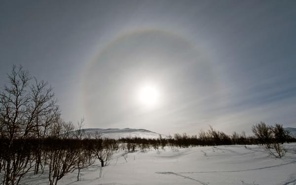 An incredible Norwegian landscape, complete with a halo around the sun