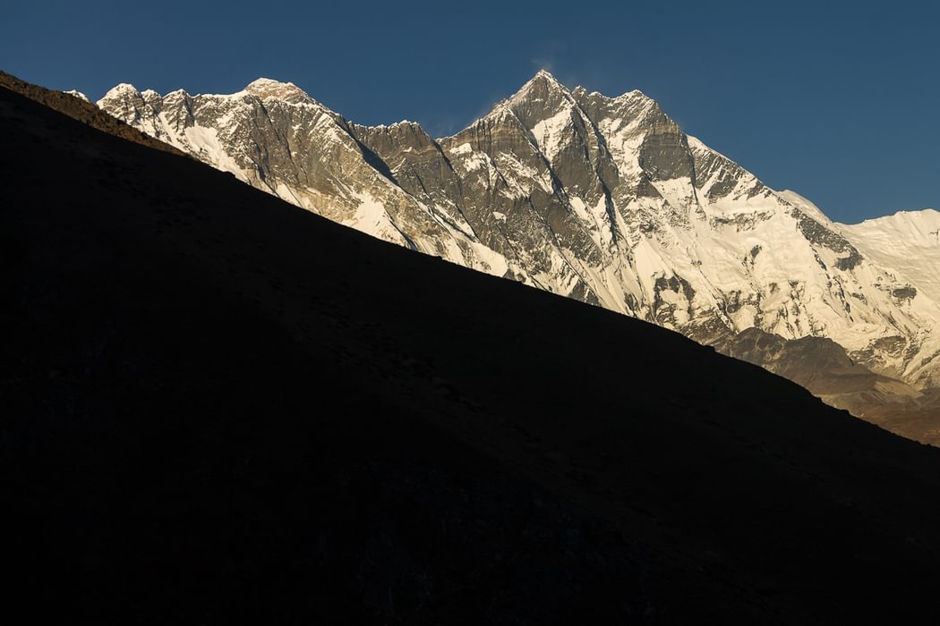 An Afternoon View From The Ridge Above  Pangboche  Lhotses South Face Dominates The View  Mount  Everest Is On The Left Behind The  Nuptse Lhotse Ridge