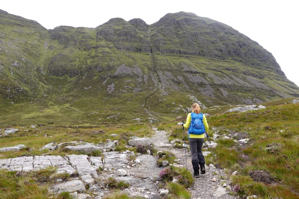Access to Suilven's summit ridge is made by an alpine path which snakes its way up to a col on the left