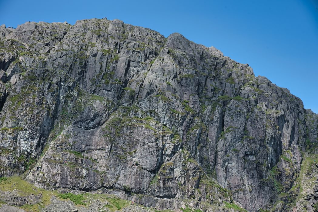 the face of Pavey Ark above Stickle Tarn. Jack's Rake takes the obvious right to left rising traverse across the face.