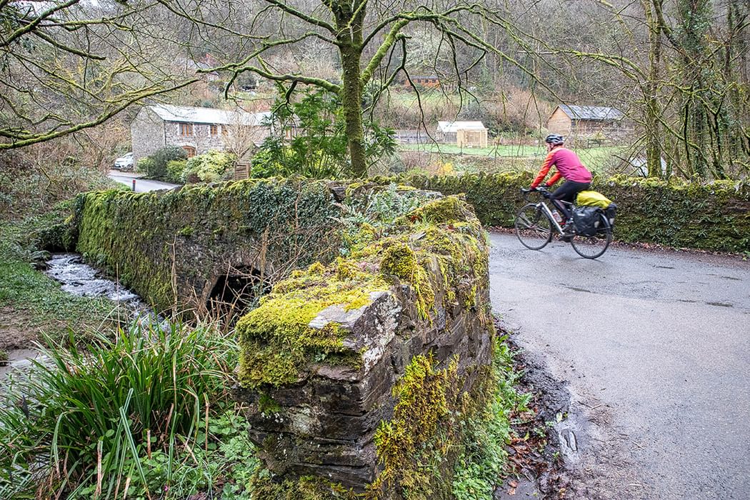 Crossing the old bridge in the tiny hamlet of Church ridge, Devon