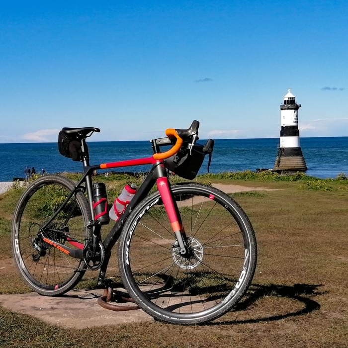 Gravel bike parked up at Penmon Point on Anglesey during a mixed tarmac/trail ride