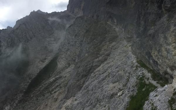 Steep paths climb massive slopes on AV2 in the Dolomites
