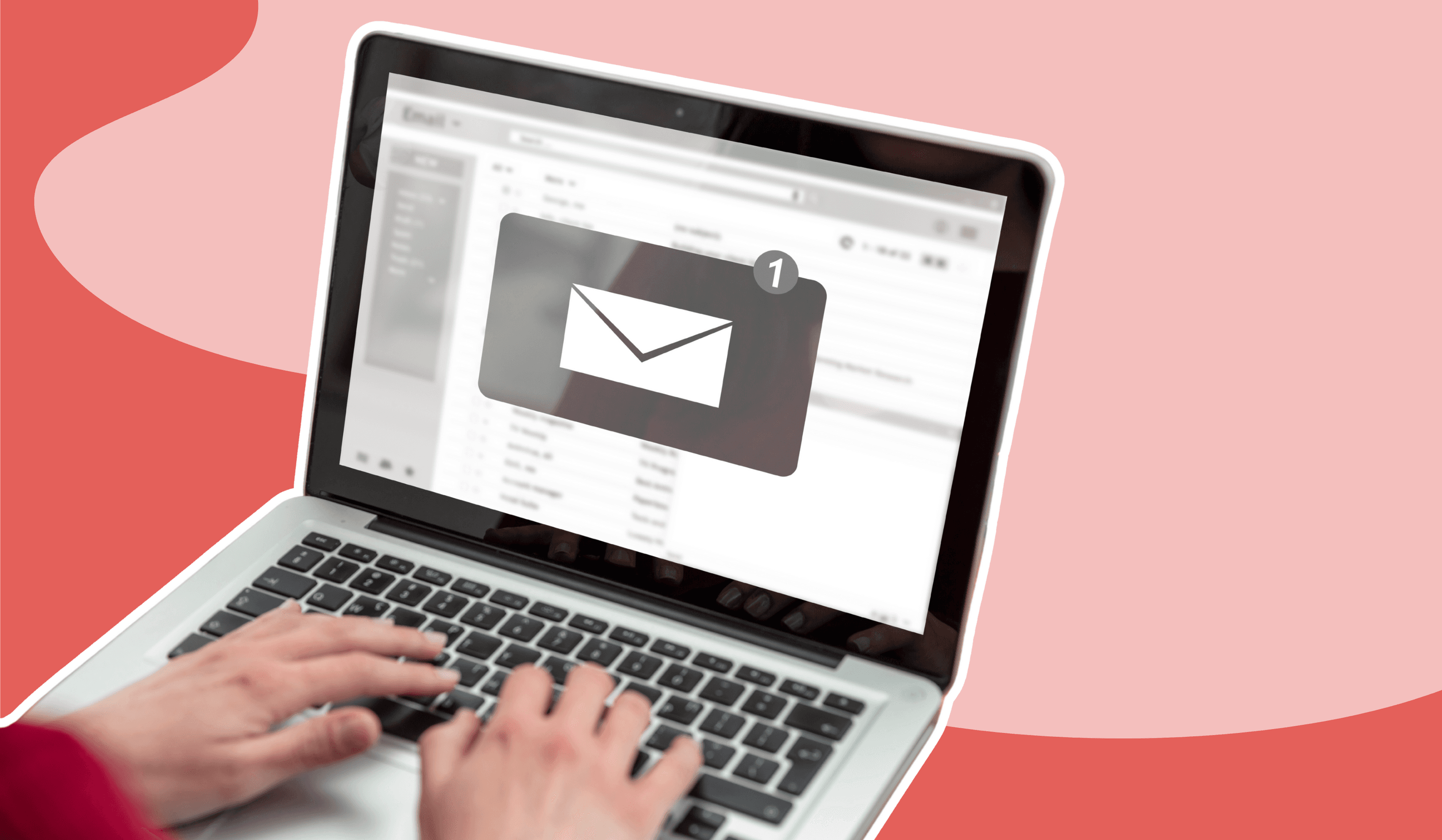 Person typing a laptop with an email popup