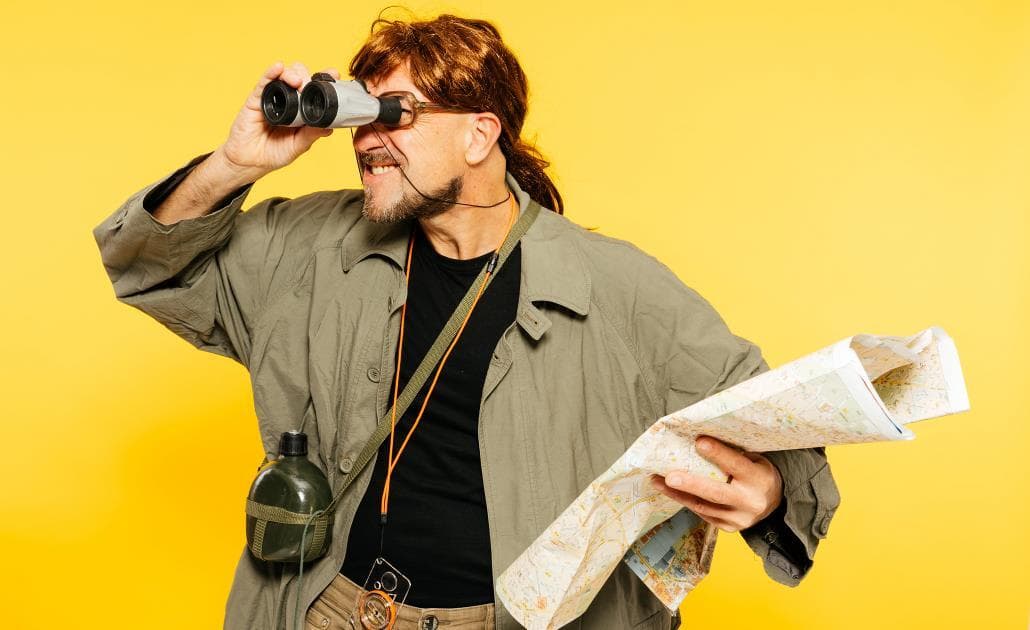 Explorer with binoculars