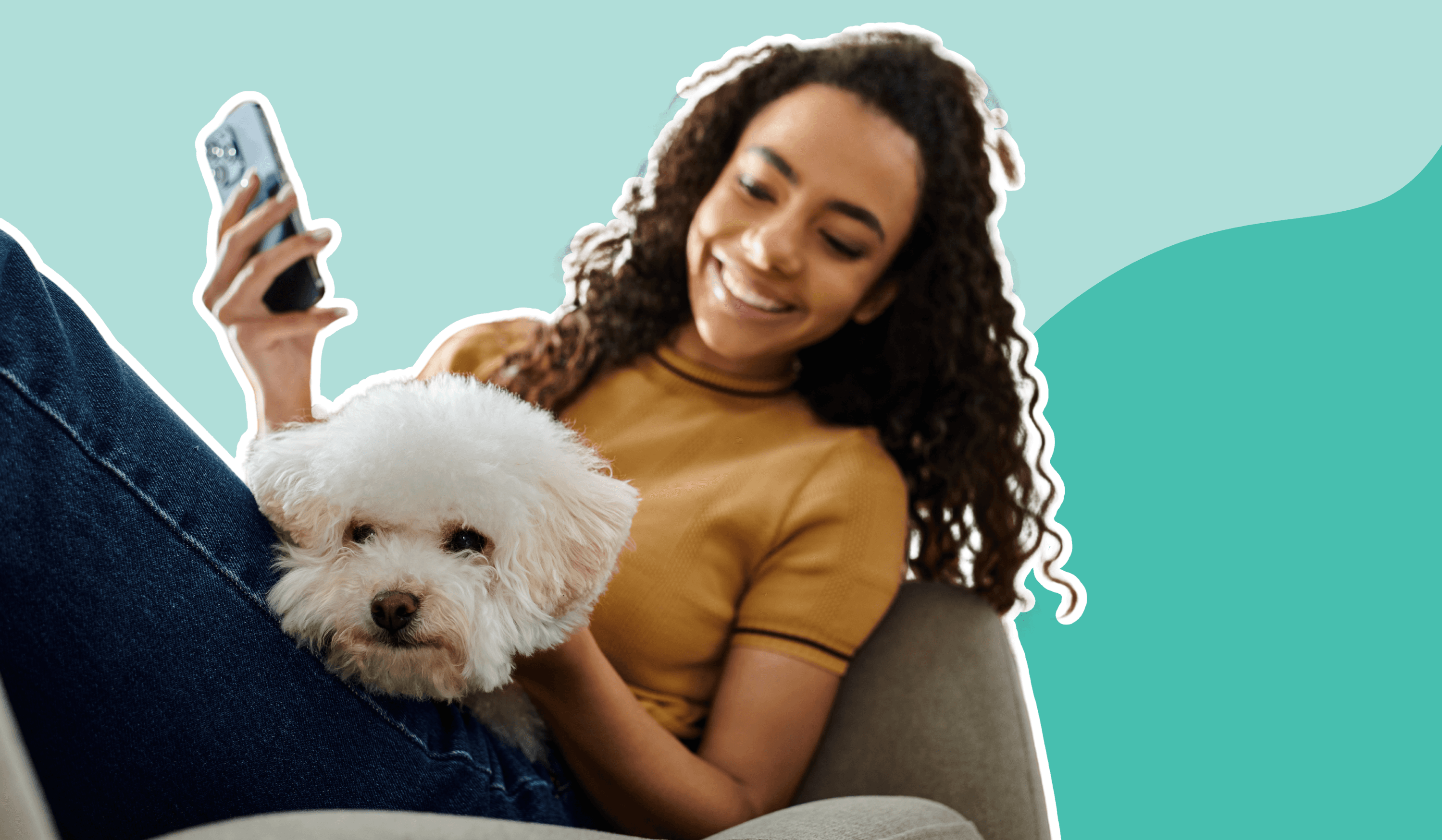 Woman holding phone and dog