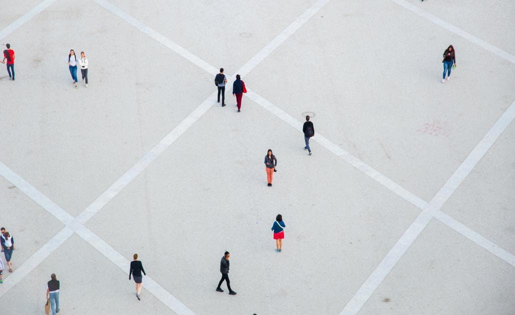 People walking in an empty square