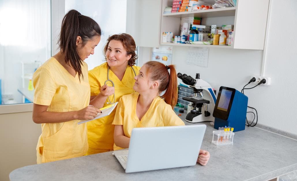Vets in yellow scrubs