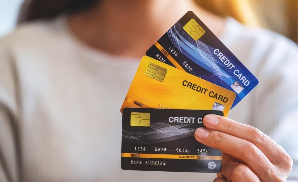 Woman holding credit cards