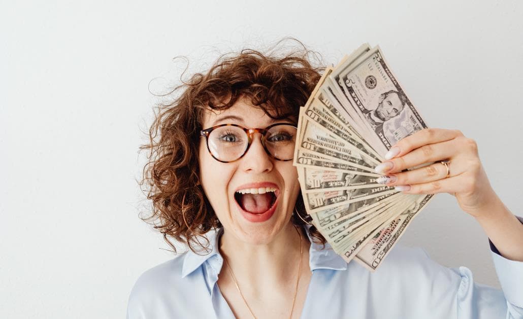 Woman fanning money