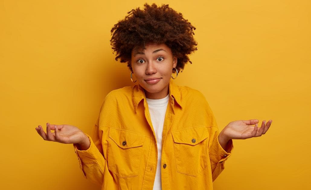 Woman shrugging