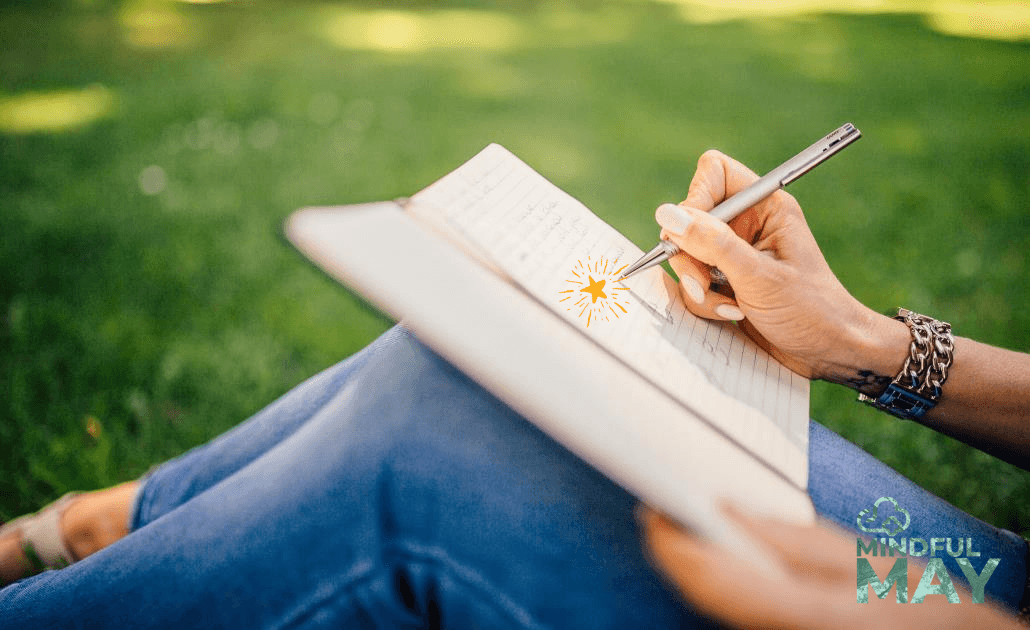 Person writing in journal