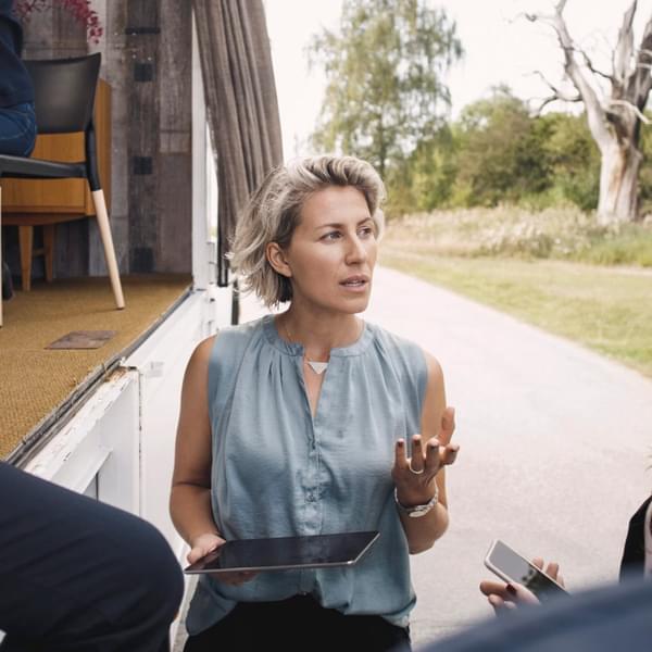 Female energy engineer in the field working for a sustainable future