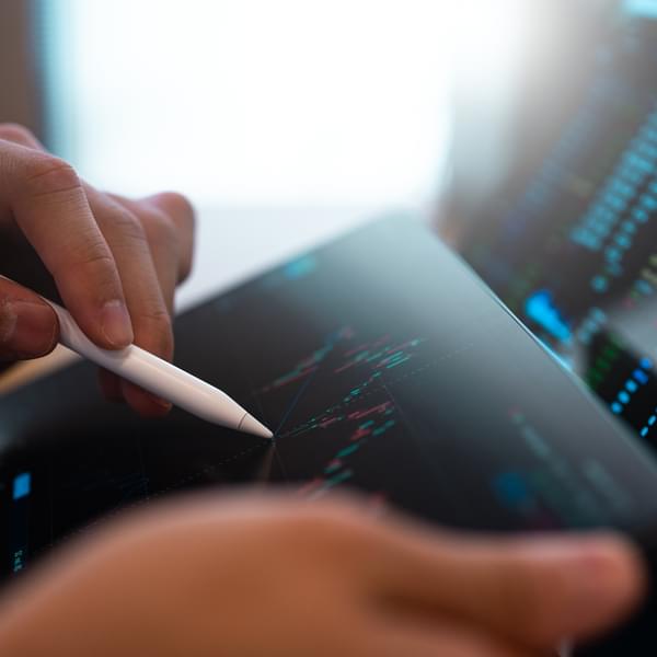 Professional working on a digital tablet