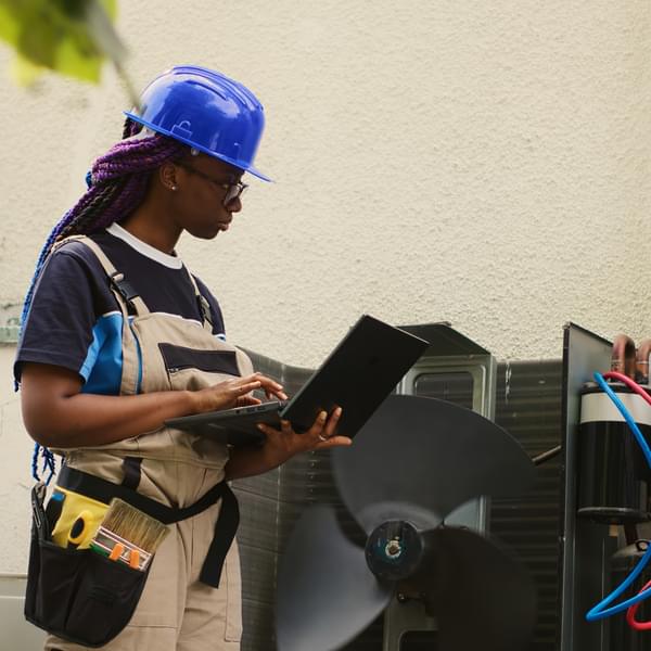 Trade Ally servicing HVAC unit