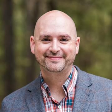 Professional headshot of James Jackson, a key member of the Grid Edge team.