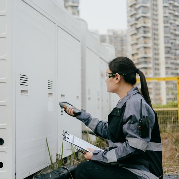 Female engineer checking HVAC
