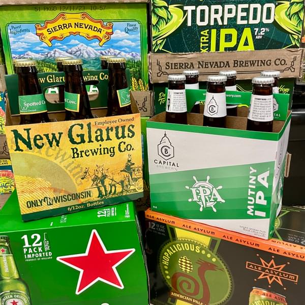 Display of different sustainable beer brands.