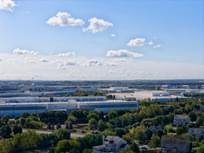 Aerial view of data center near residential area.