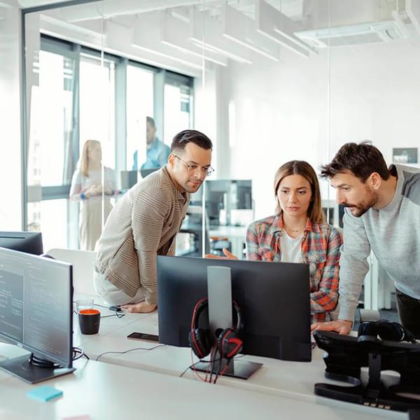Team of professionals working together in office