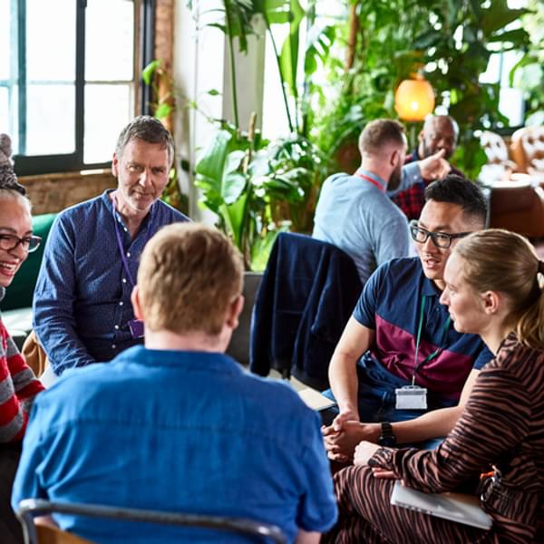 Group of community peers in discussion