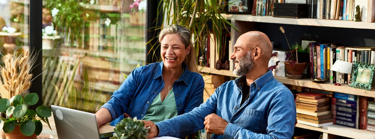 Mature couple buying heat pump water heater online.