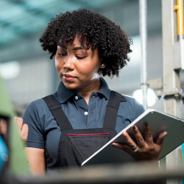 Female engineer analyzing data
