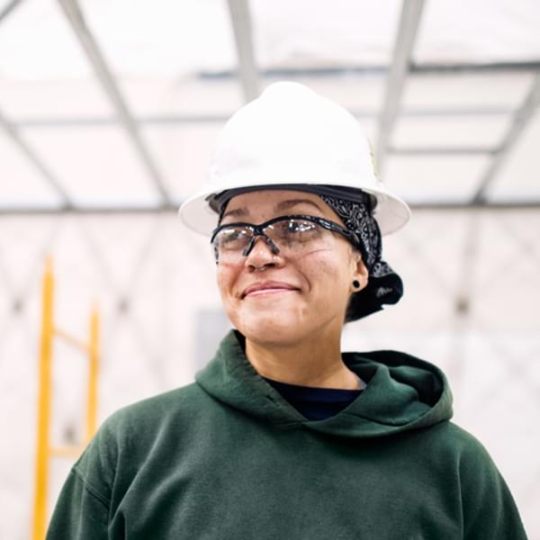Woman construction worker on the job site.