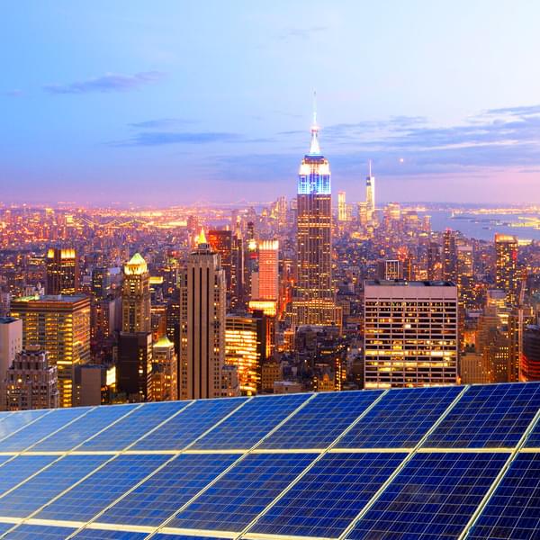 Solar power station over New York City skyline.