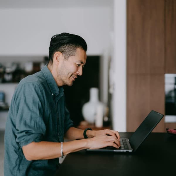 Cybersecurity worker protecting software.