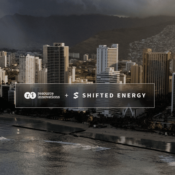 RI + Shifted Energy logos on a background of the Honolulu shoreline