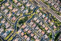 Aerial view looking directly down on homes in a planned exclusive residential community
