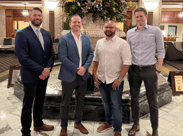 Resource Innovations team winning an award