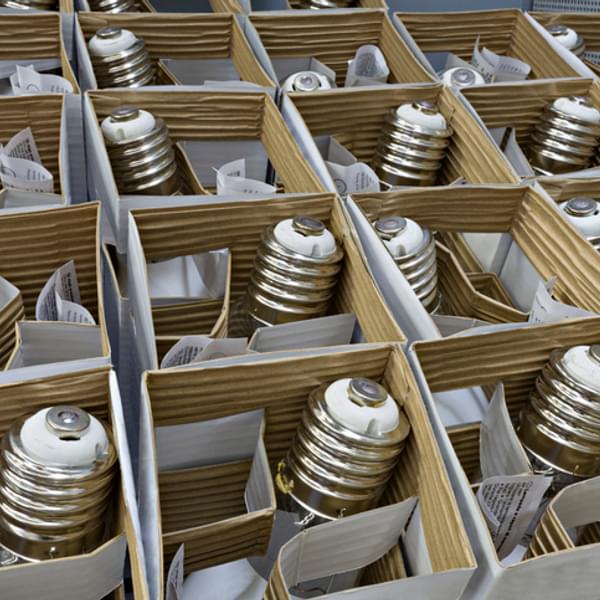 Boxes of packaged LED light bulbs.