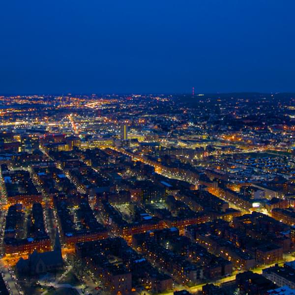 City at night illuminated by electricity and lights