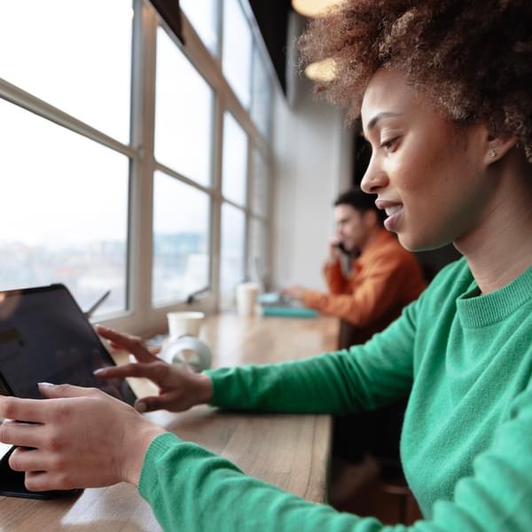 Happy female professional working remotely