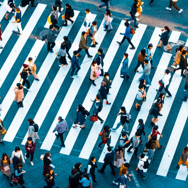 aerial-view-of-a-busy-crosswalk-full-of-people