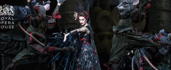 A group of dancers all dressed in black